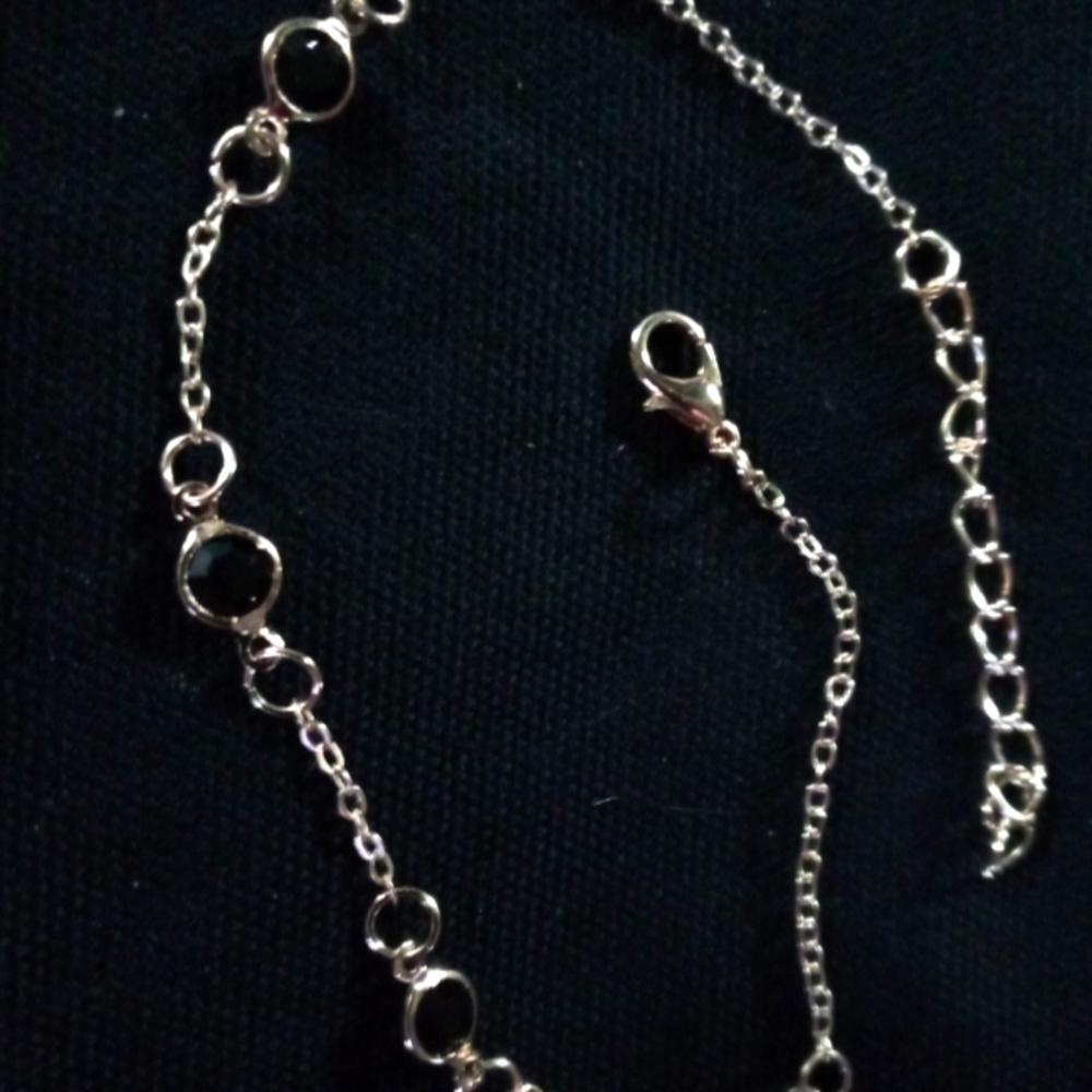 Gold anklet with black stones